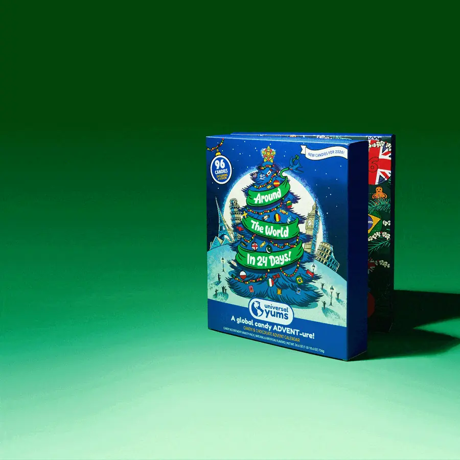 The Around The World Candy Advent Calendar on a green background, turning and opening to show its 24 flag-ornament doors and the booklet.