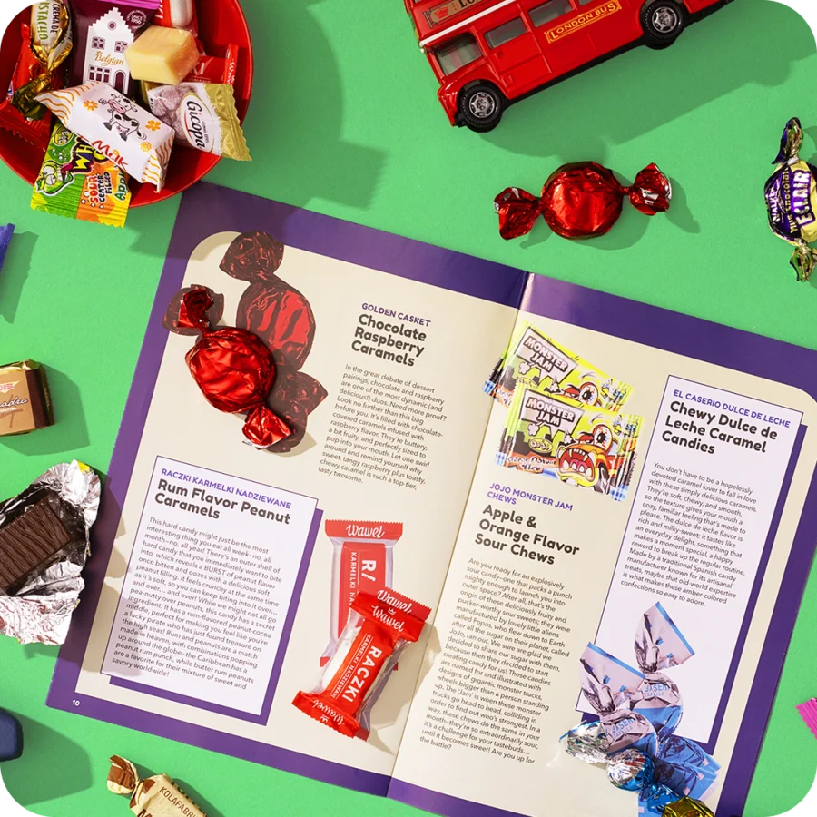 The Around The World Candy Advent Calendar booklet open on a green table with candy and a toy truck.
